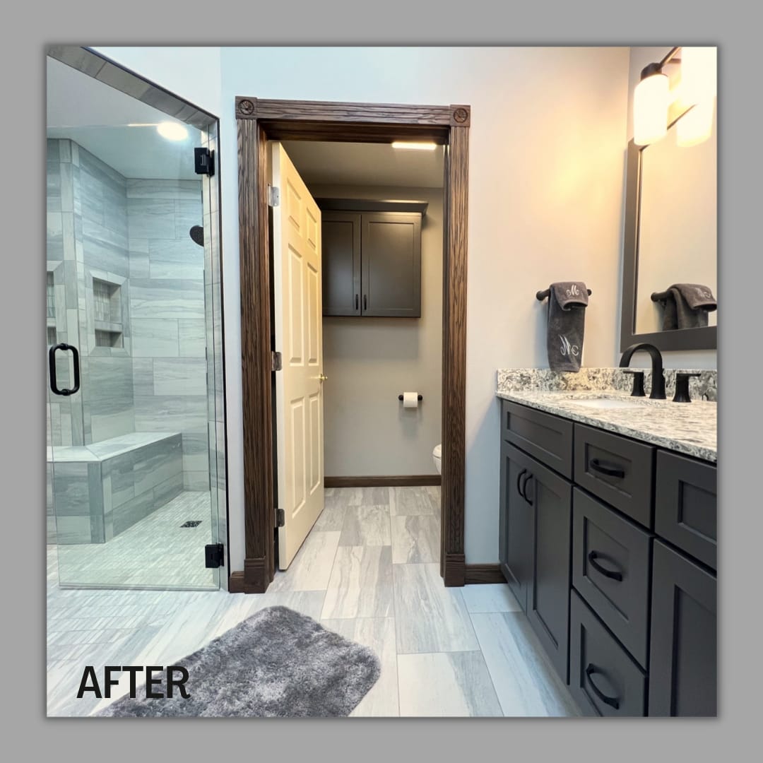 Bathroom with glass tile shower, dark shaker vanity, speckled granite top, matte-black fixtures, wood-look tile flooring, Erie County