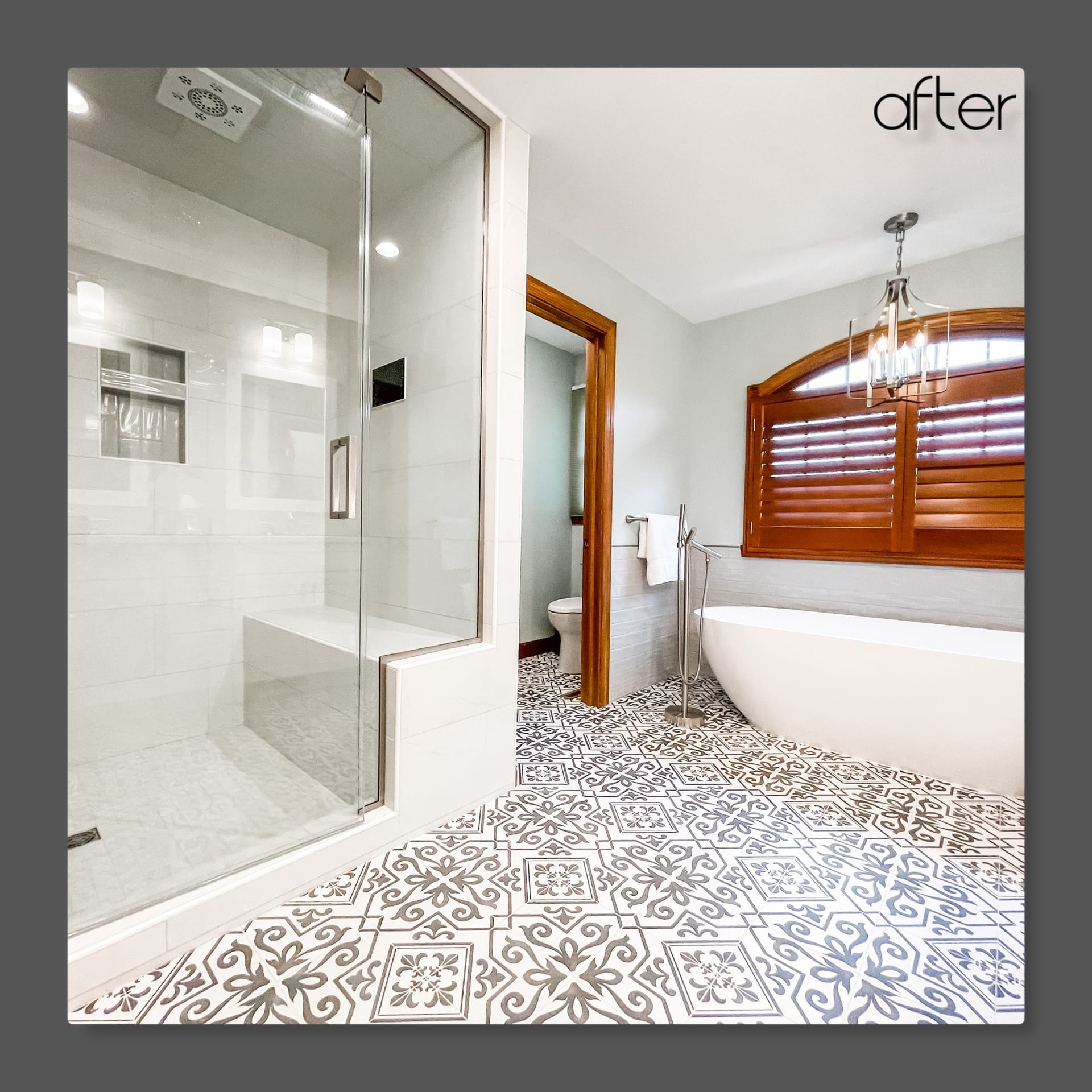 Bathroom with glass tile shower, freestanding soaking tub, patterned cement tile floor, and wood plantation shutters, Edinboro