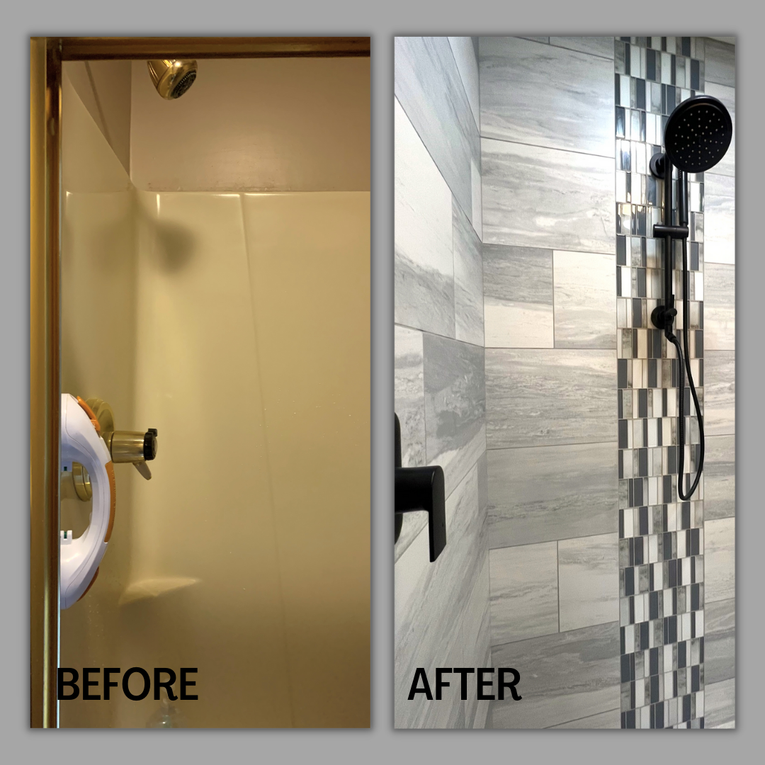 Tiled shower with grey marble-look walls, vertical glass mosaic accent, and matte black handheld fixtures