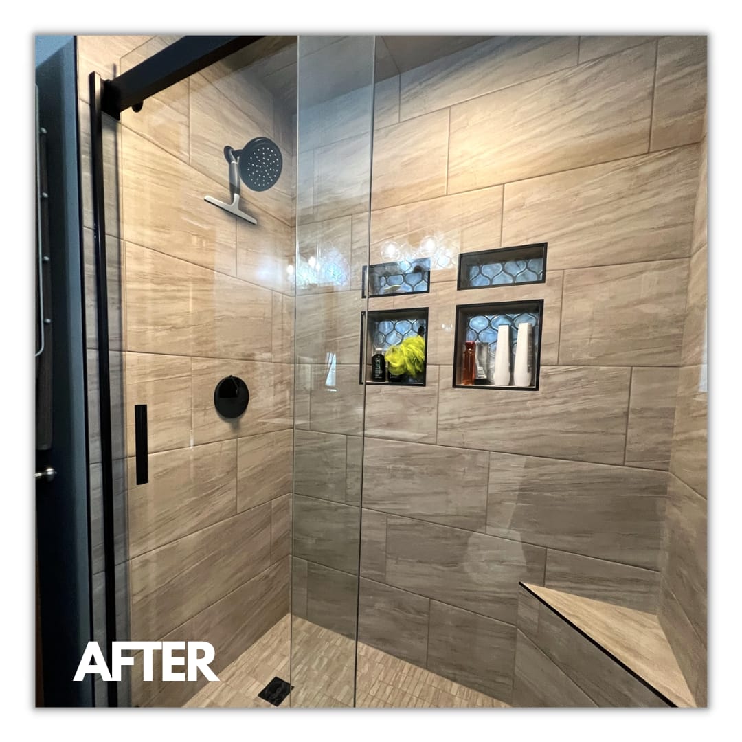 Glass tile shower with wood-look tile walls, black hex mosaic niches, matte-black fixtures, and tile bench, Erie PA