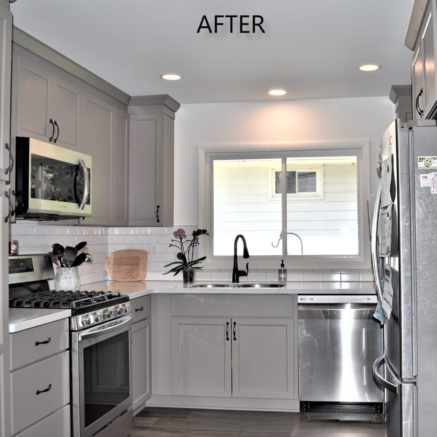 Light grey shaker kitchen with white subway tile backsplash, white counters, stainless appliances, and wood-look plank flooring