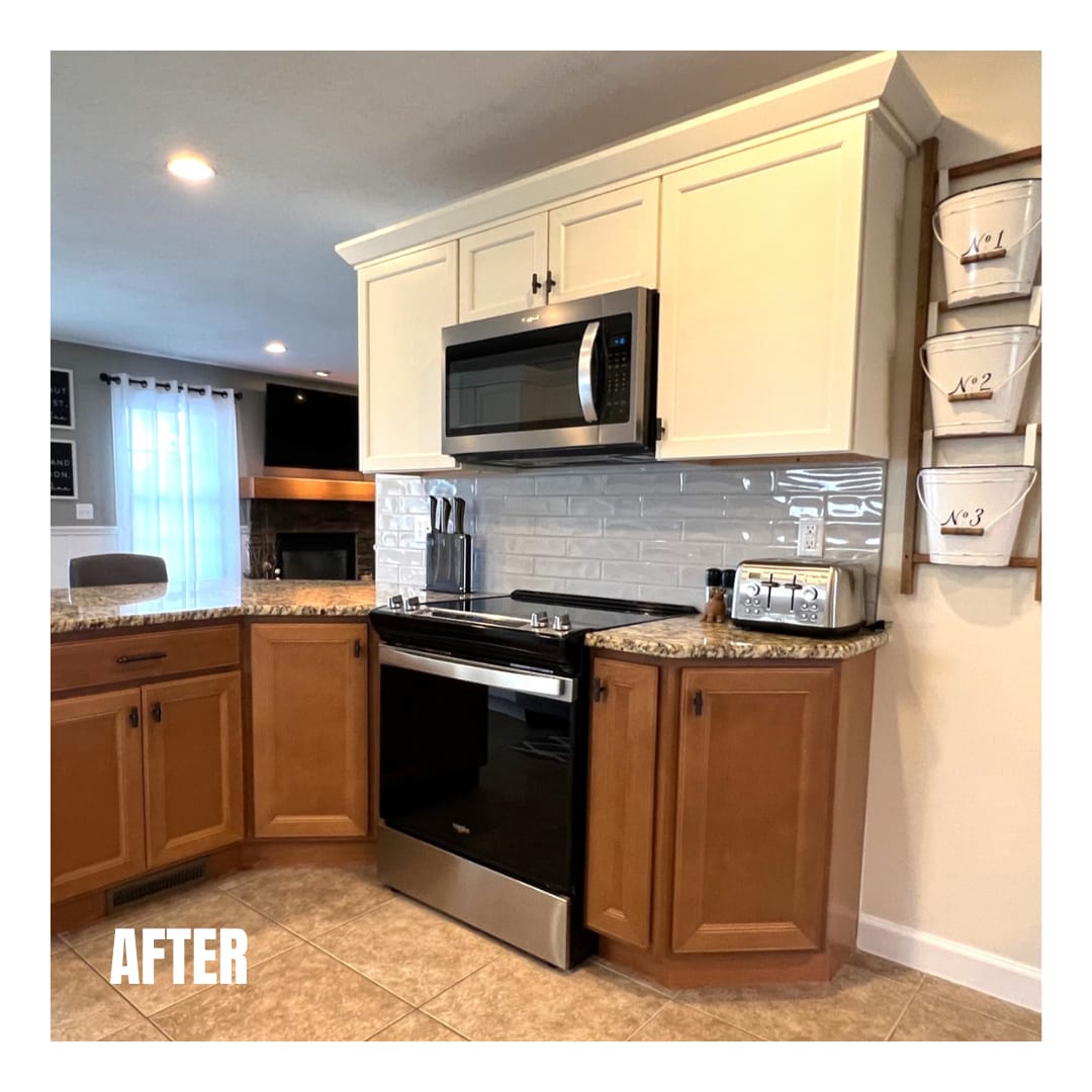 Two-tone kitchen with cream uppers, oak lowers, grey subway tile, tan granite counters, and tile flooring, Erie County