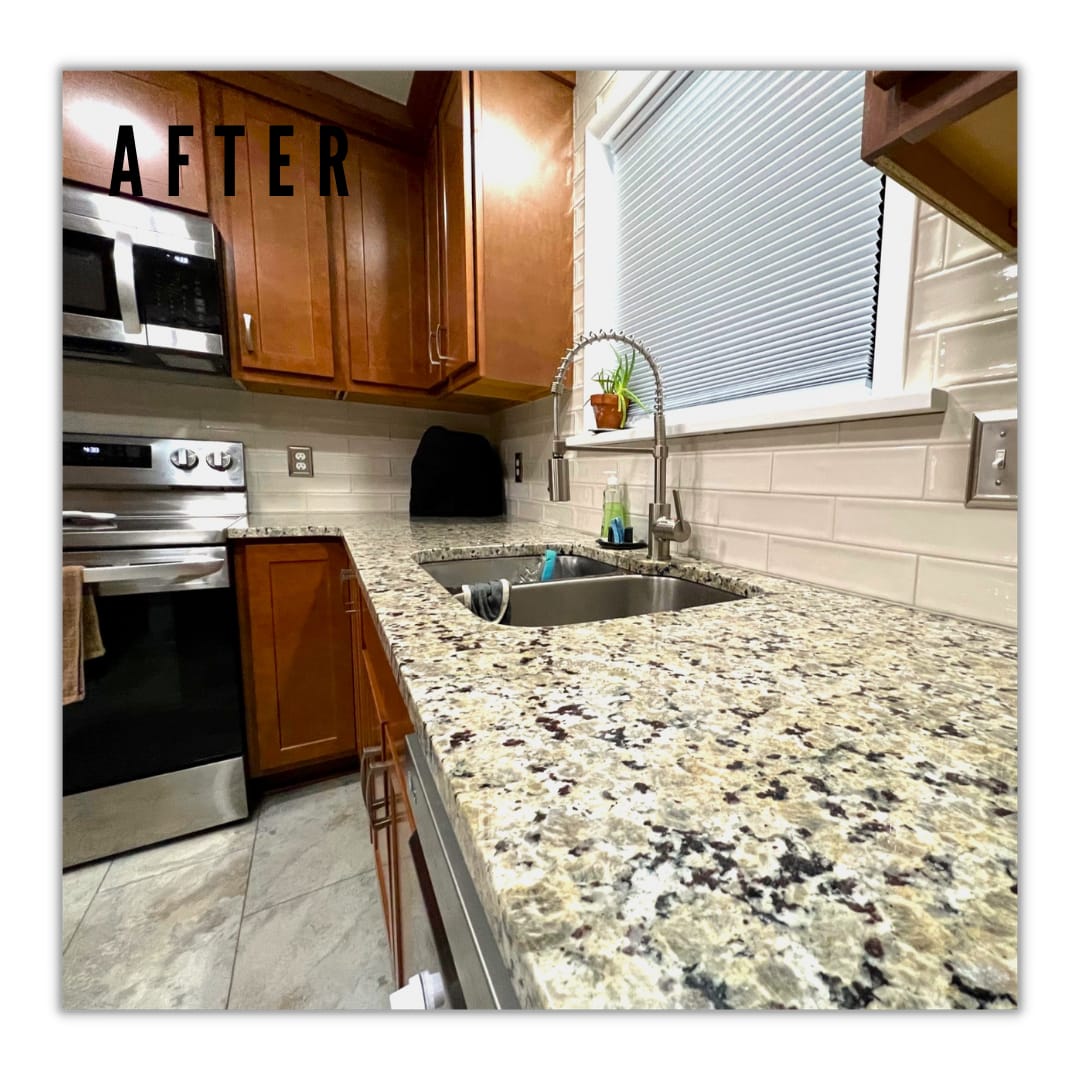 Cherry-toned shaker kitchen with tan subway tile, speckled granite counters, stainless appliances, and tile flooring, Erie County